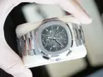 Patek Philippe Nautilus Travel Time Flyback Chronograph (2024) - Ref. 5990/1A‑011 | Watch Scout thumbnail 9
